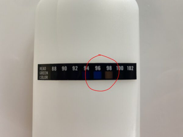 temperature strip on a synthetic urine bottle